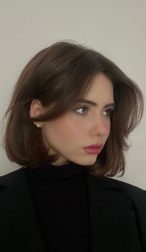 50+ New Haircut Ideas For Women To Try In 2023 _ Natural Brown Bob with Bangs