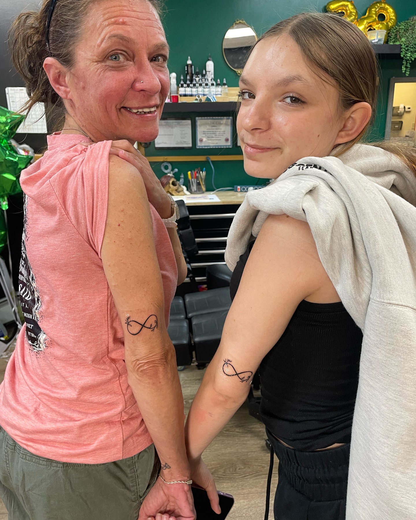 dainty-infinity-tattoos-with-leaves-matching-tattoo-mom-daughter