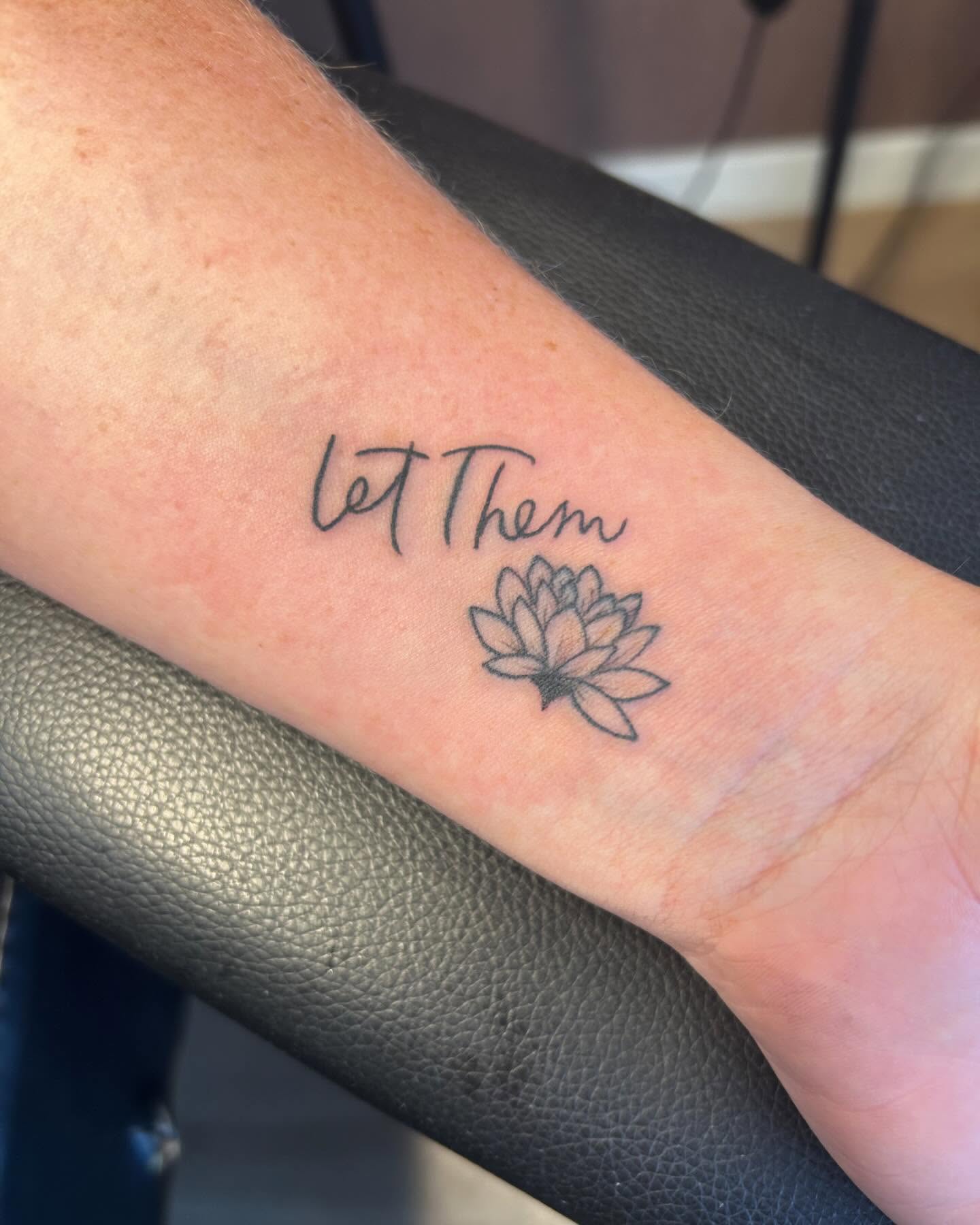 let-them-tattoo-with-lotus-on-arm