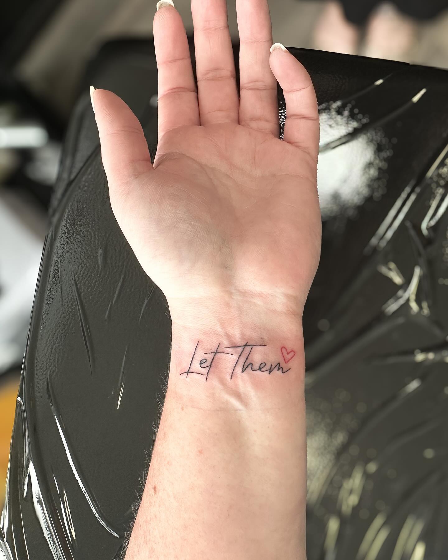 let-them-with-heart-on-wrist