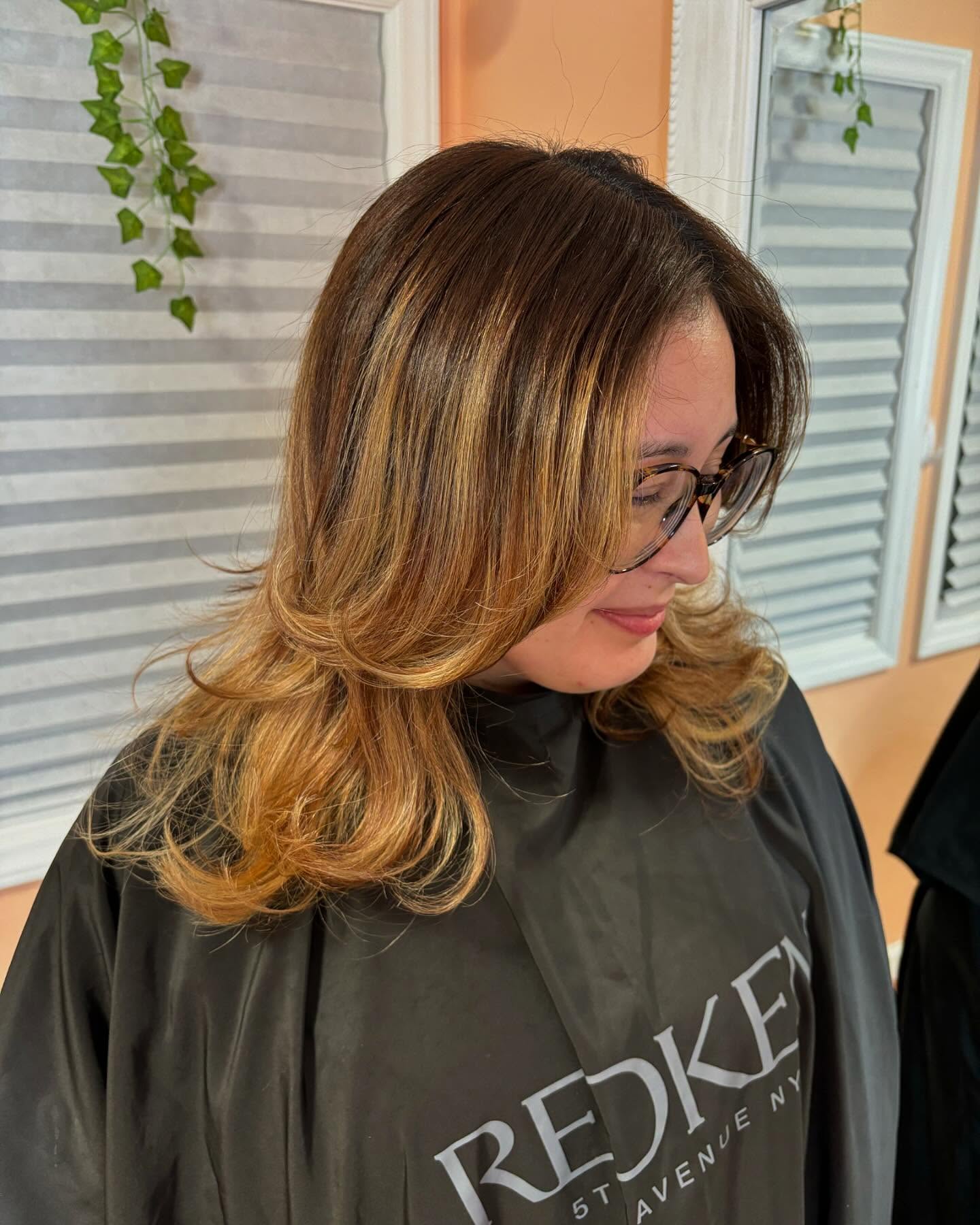 middle-parted-layered-cut-with-highlights