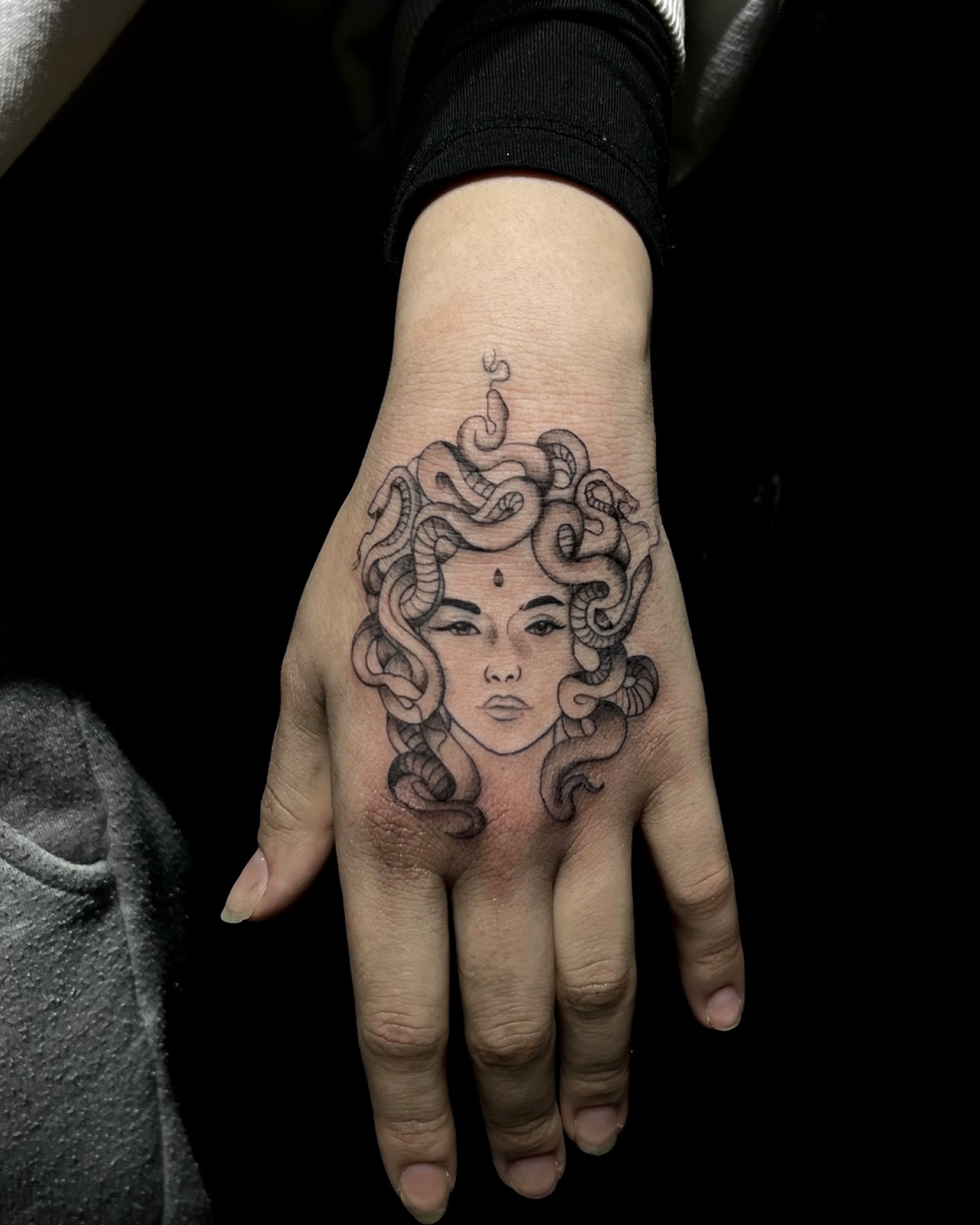 medusa-wrist-tattoo