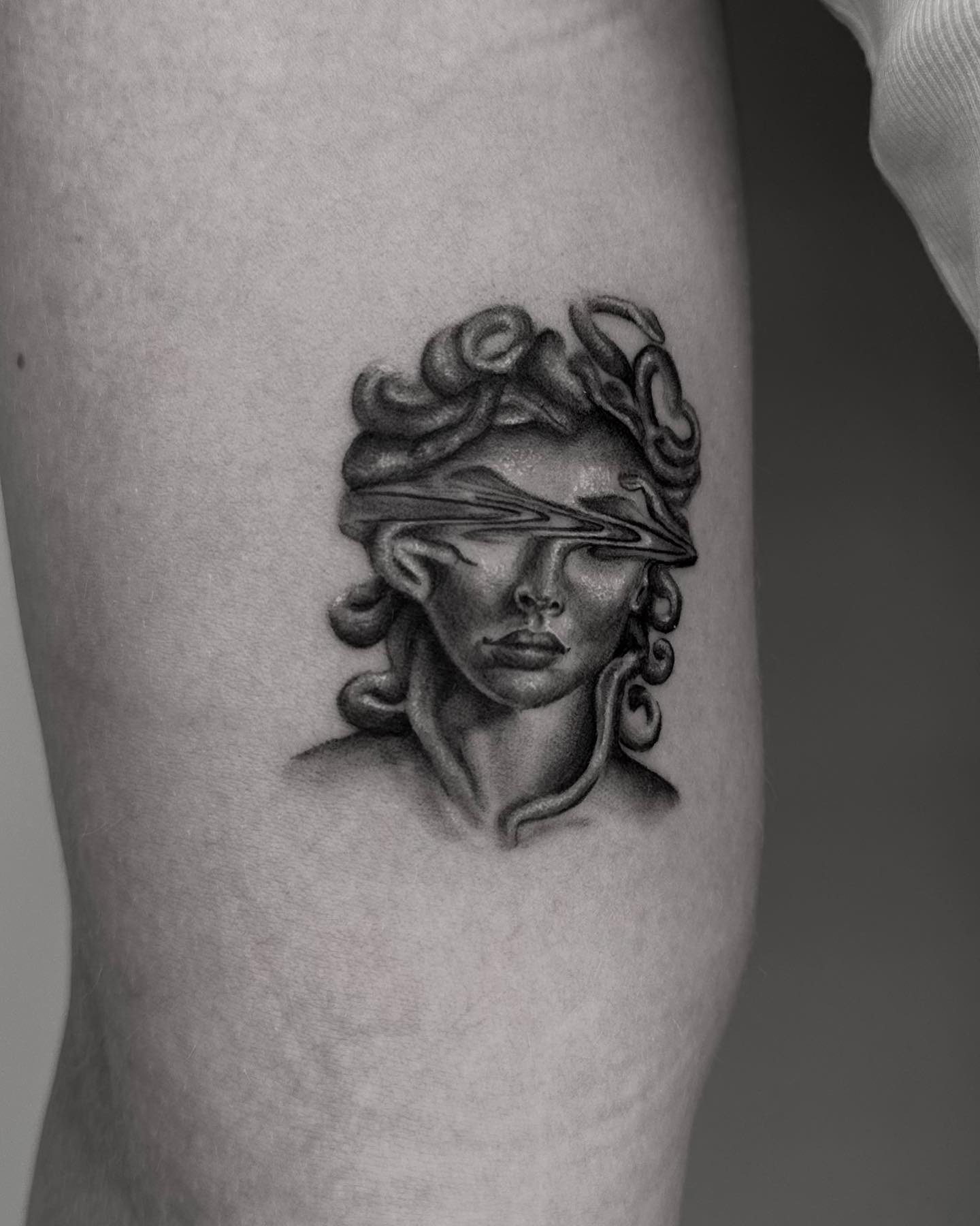 glitched-medusa-tattoo-on-arm