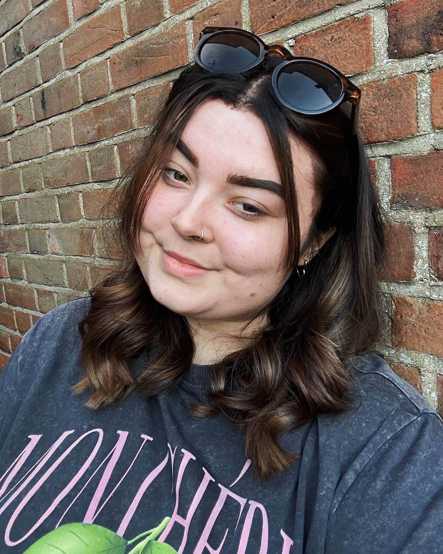 Medium-Length Layered Cut with Soft Curls