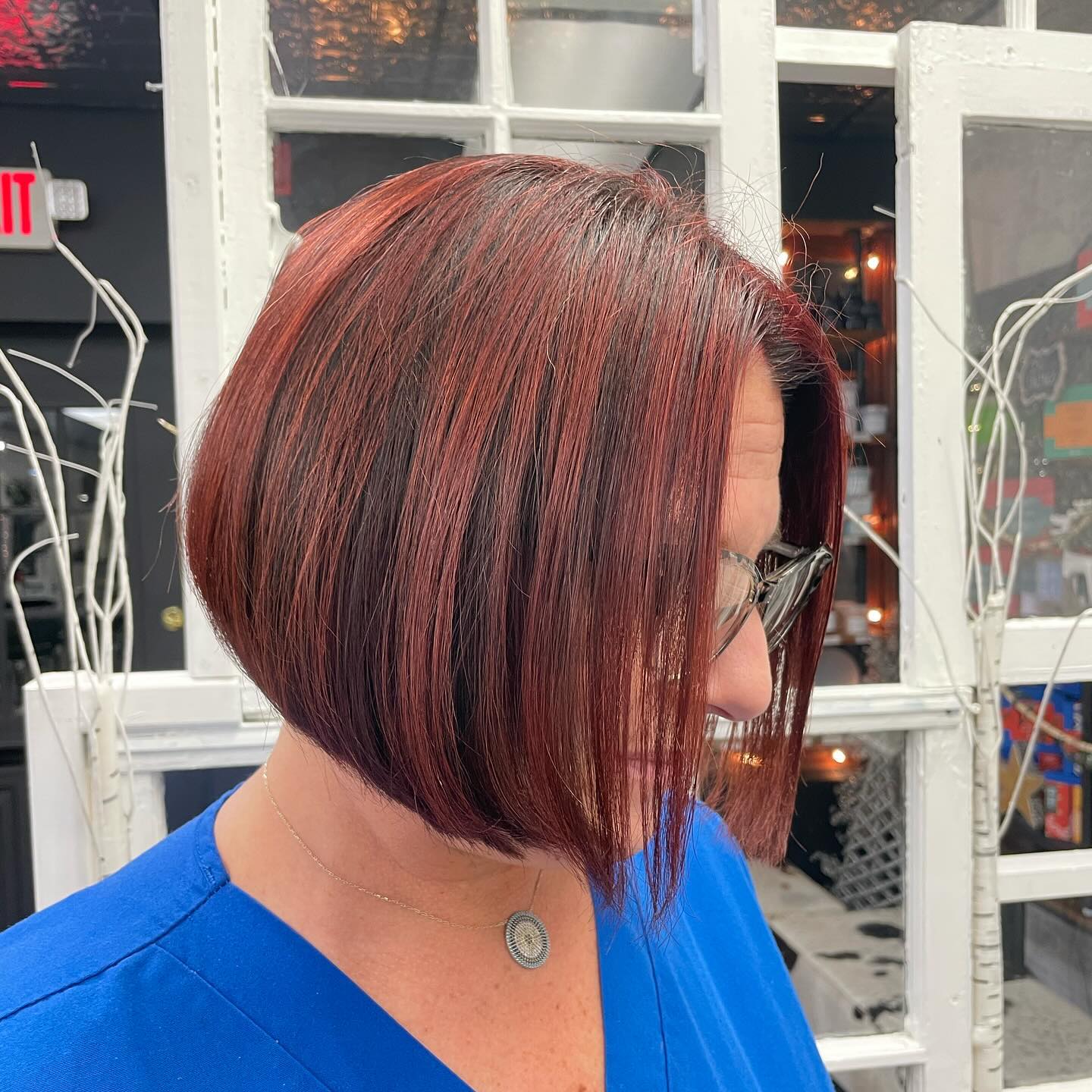 angled-bob-with-red-highlights