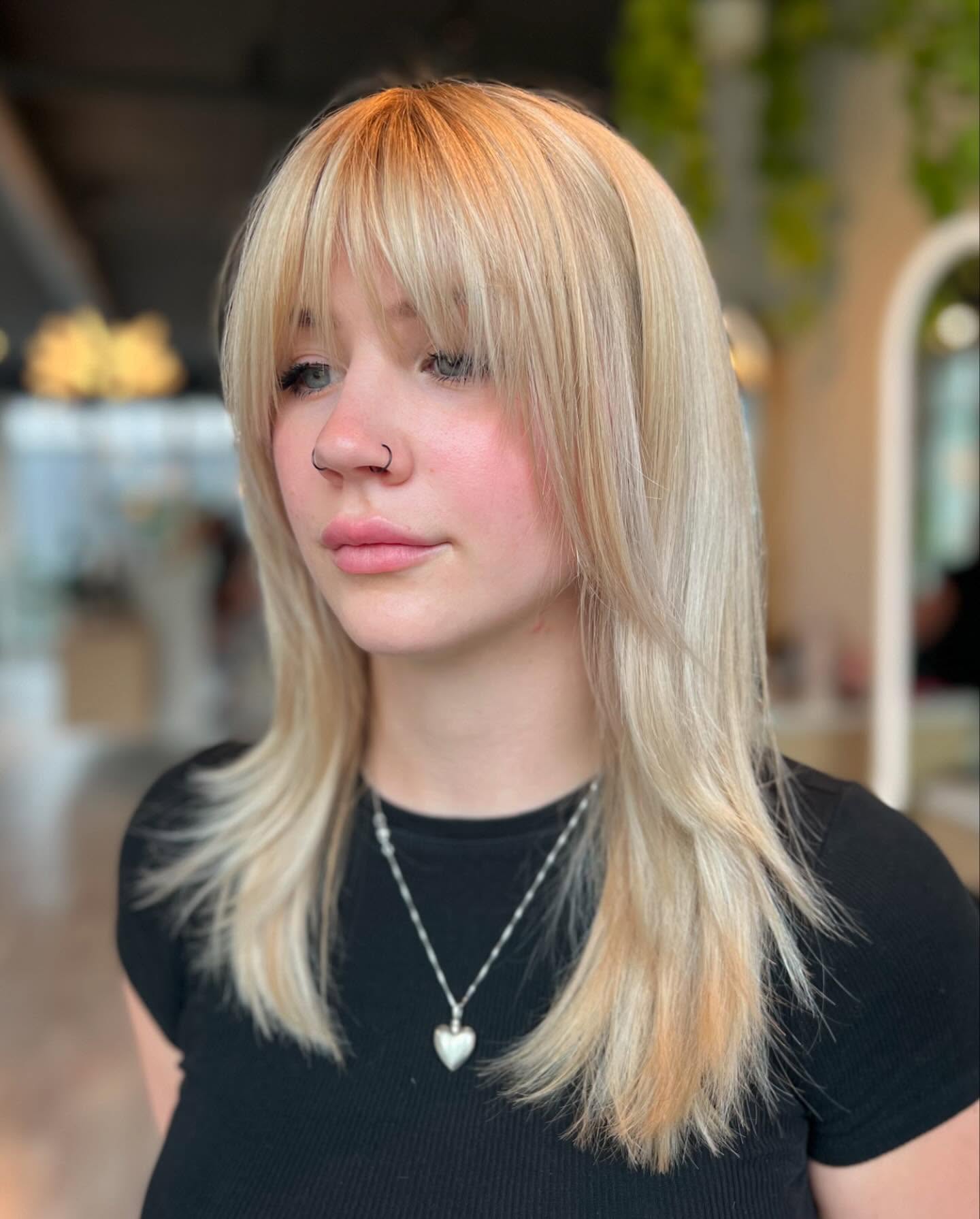 medium-haircut-with-wispy-bangs