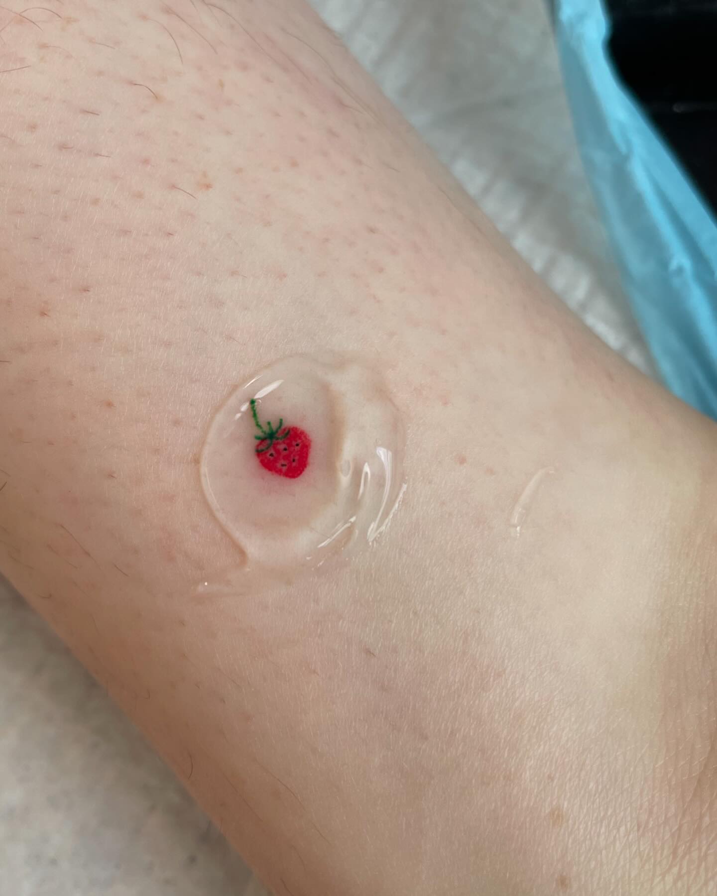 small-strawberry-tattoo
