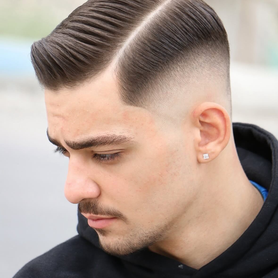 side-parted-slick-back-haircut-with-fade
