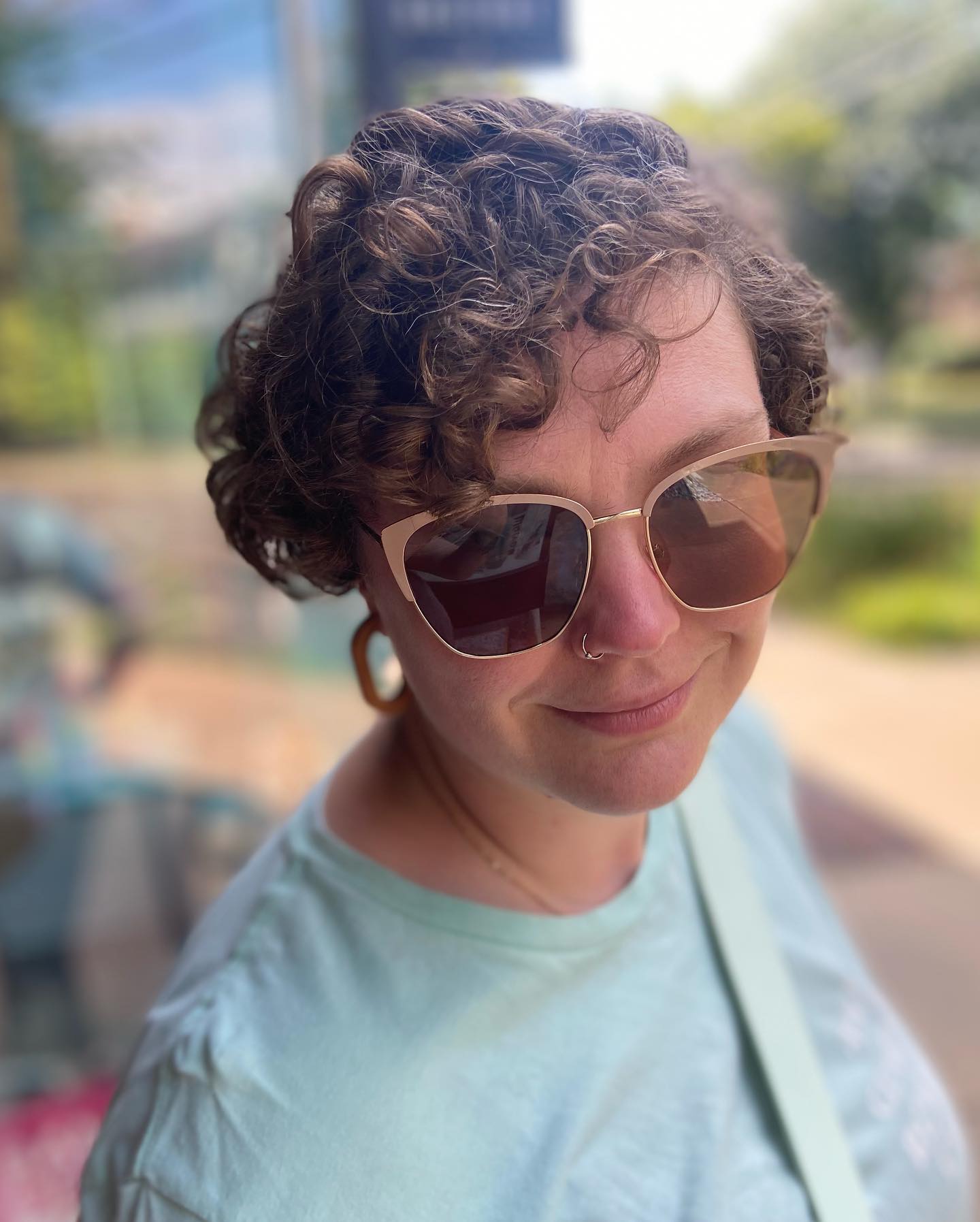 side-parted-short-curly-hair-with-glasses