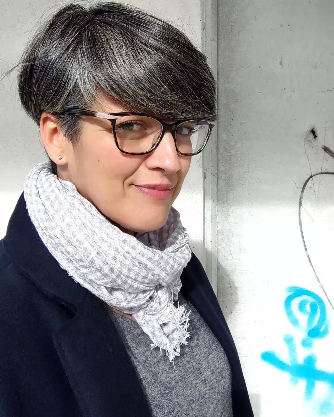layered-gray-pixie-with-glasses