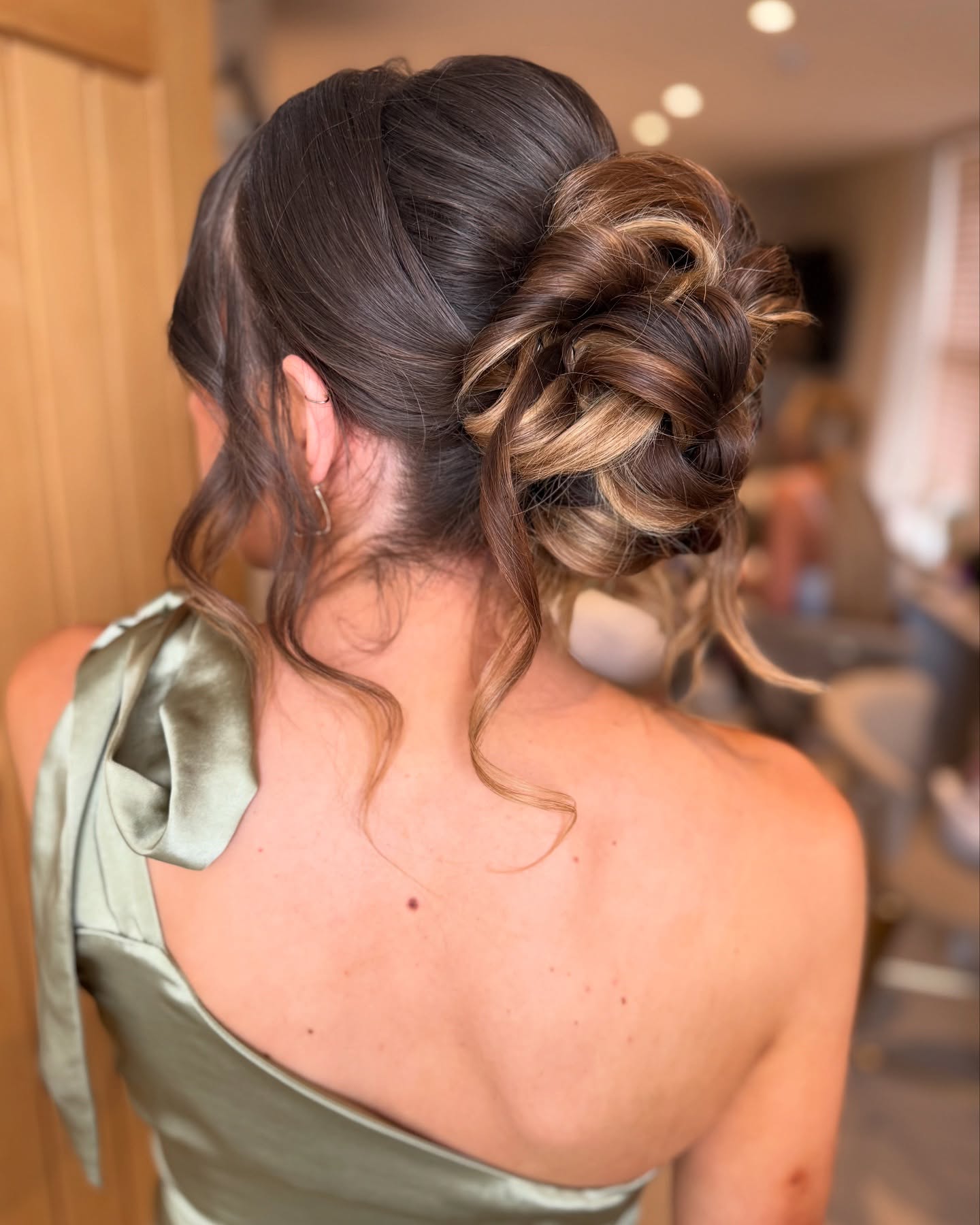curly-bun-with-highlights