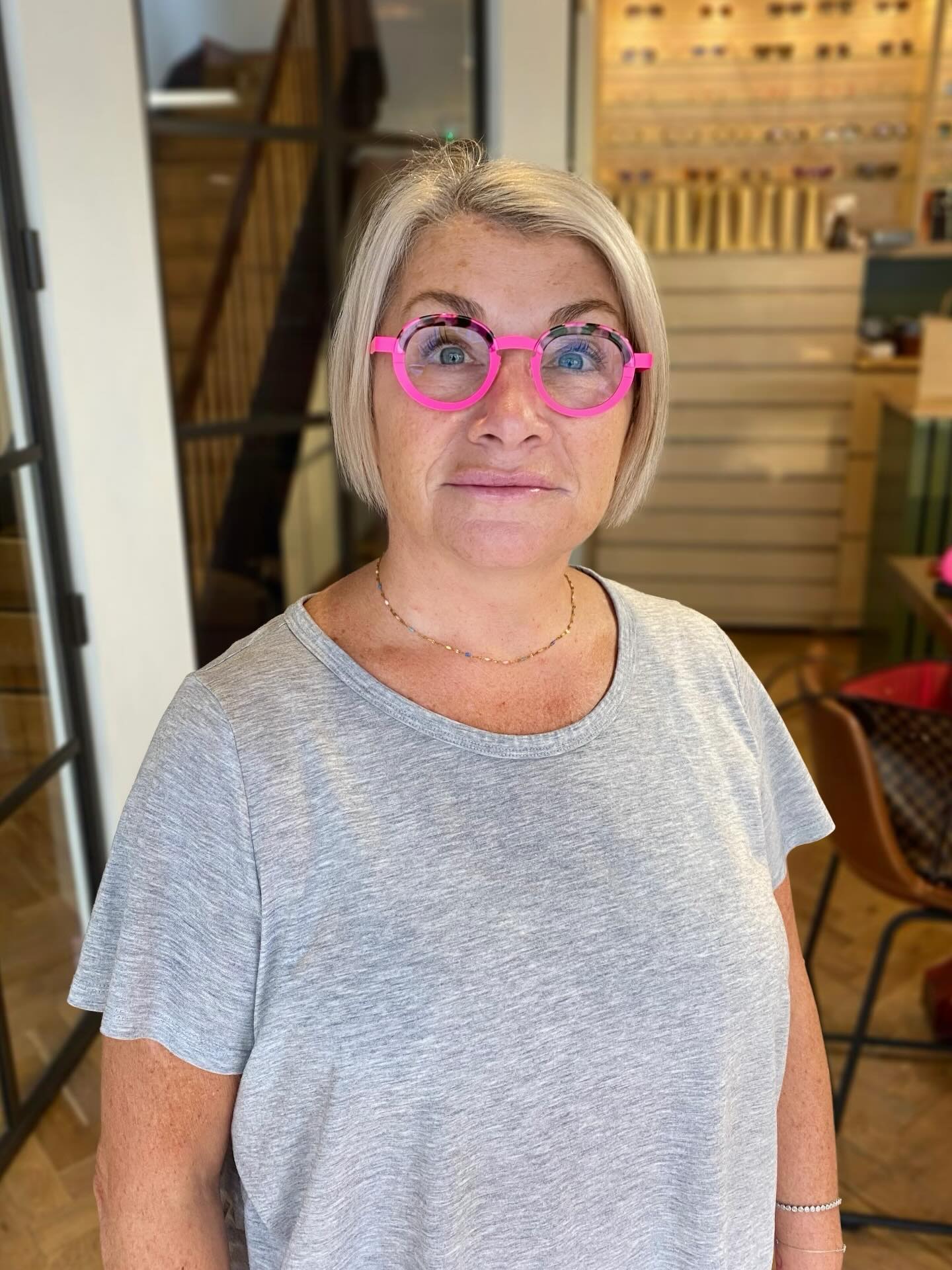 pink-glasses-on-short-blonde-bob