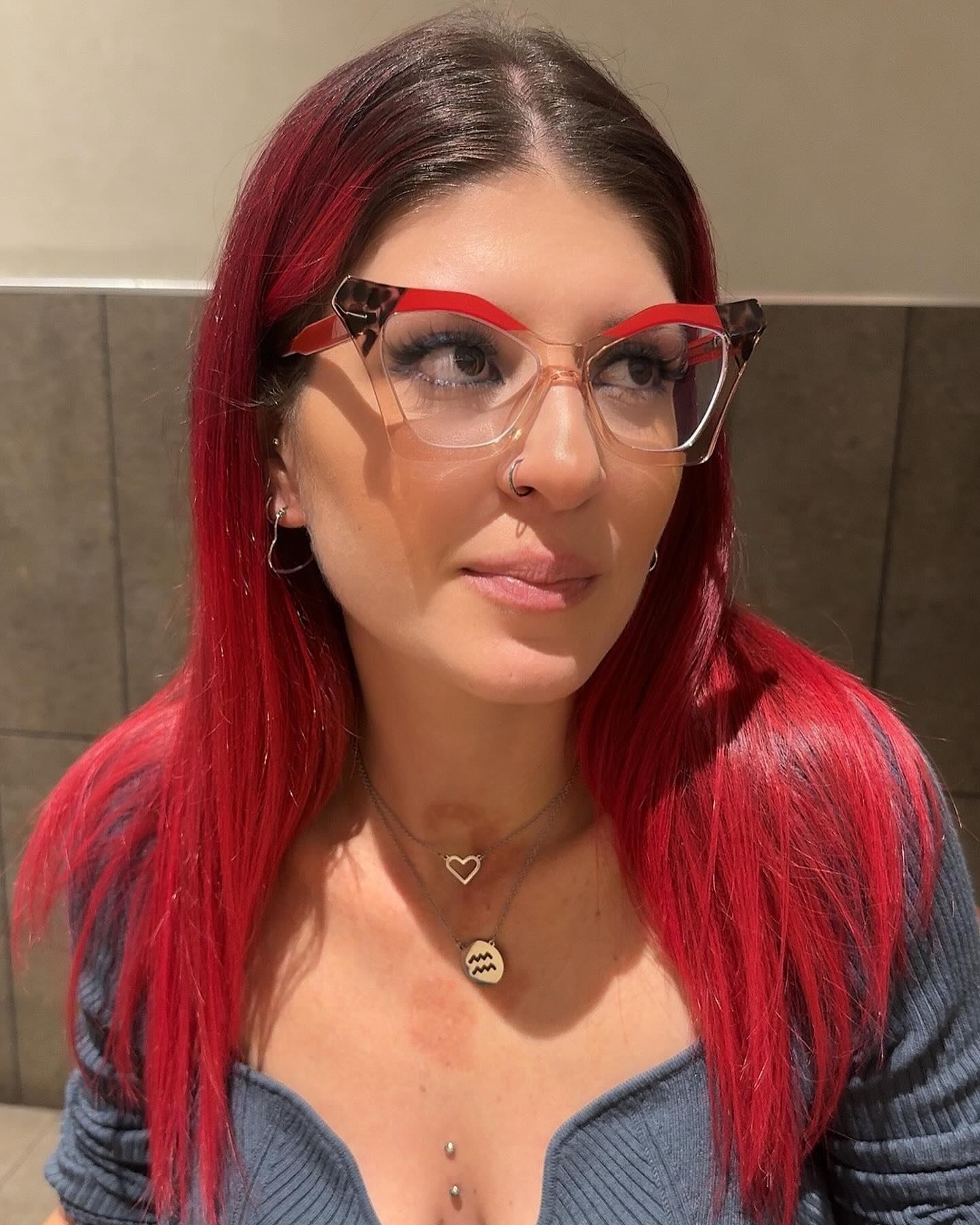 cat-eye-glasses-on-red-straight-hair