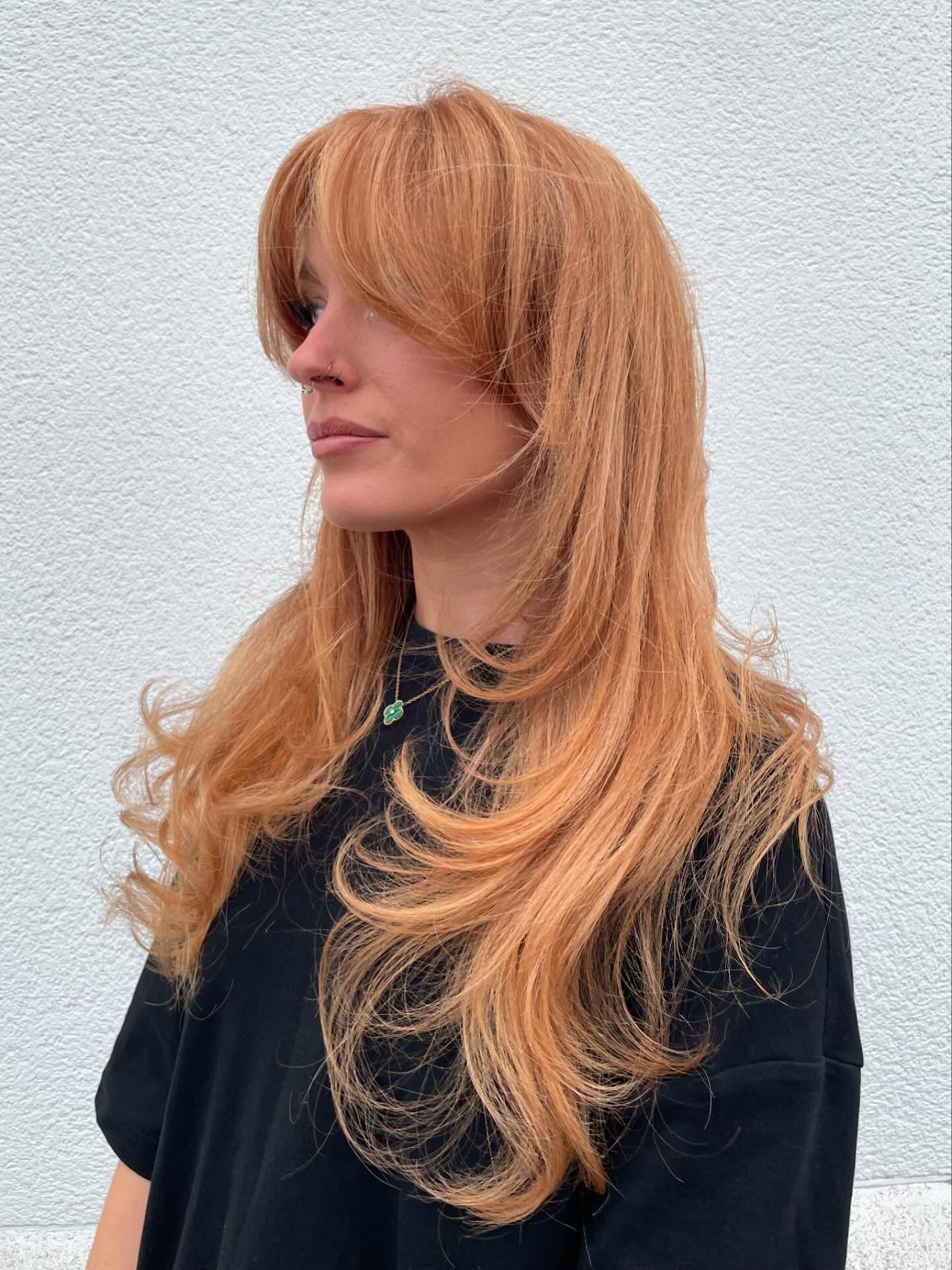 strawberry-blonde-haircut-with-bangs