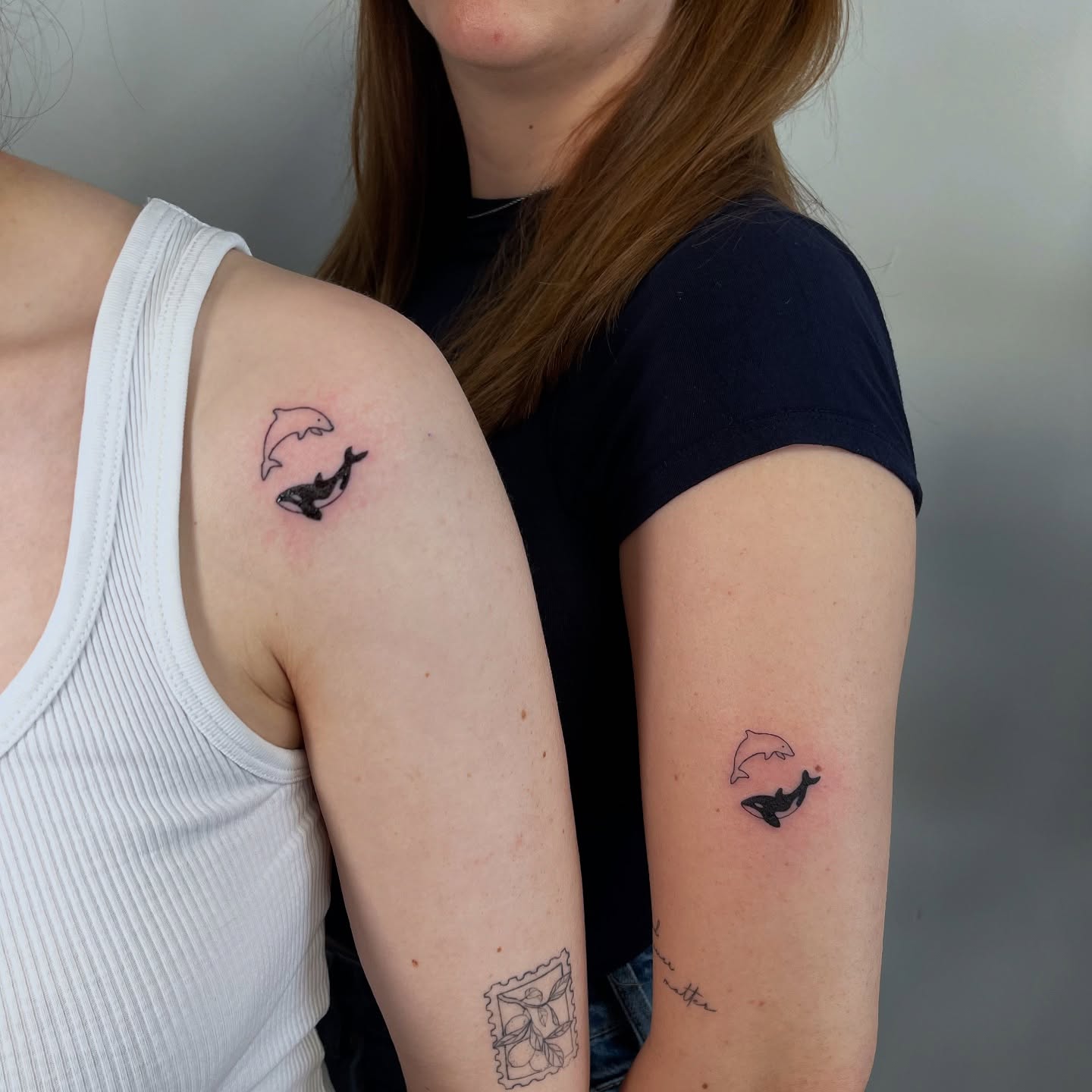 matching-dolphin-tattoo