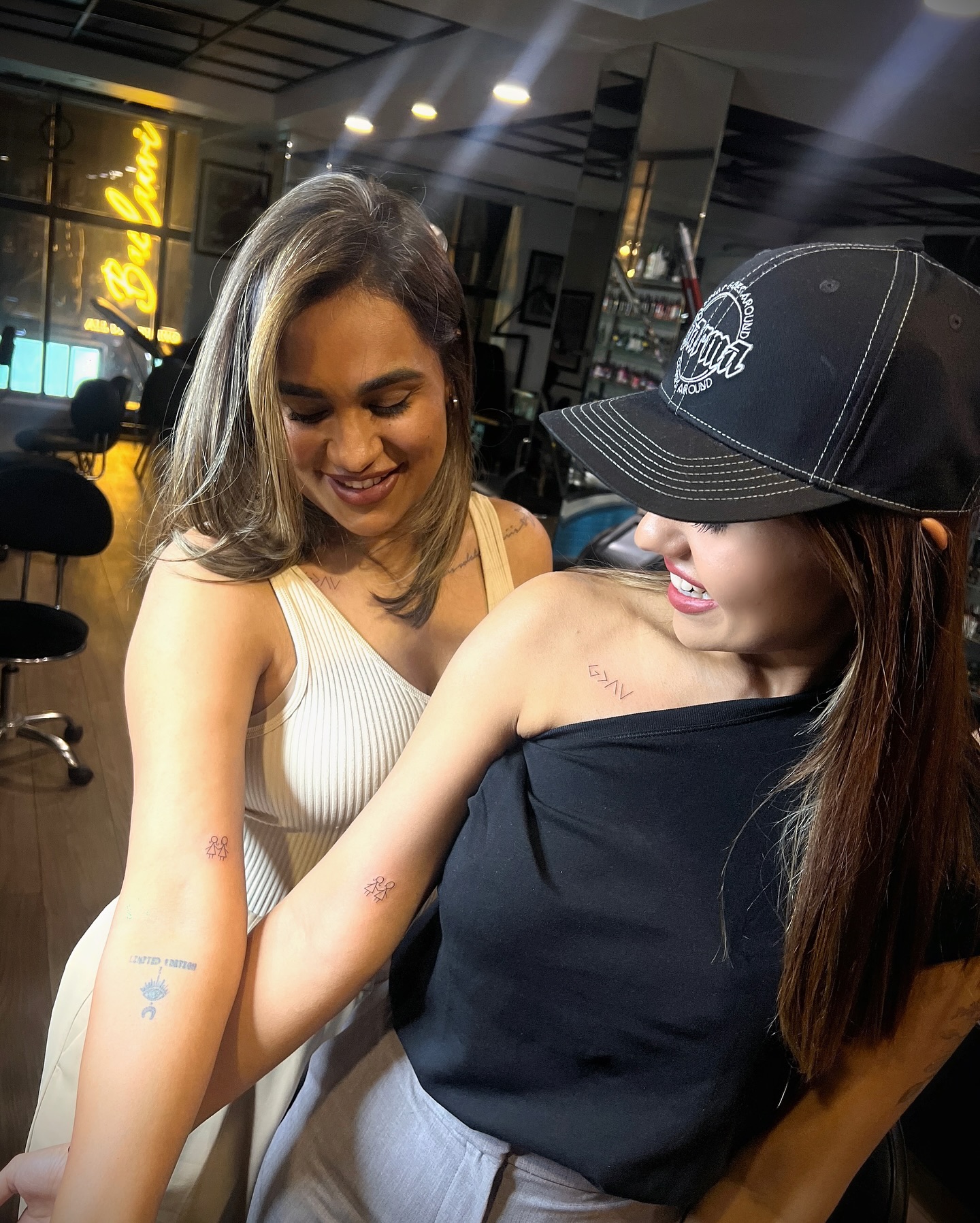 2-sister-symbol-matching-tattoo