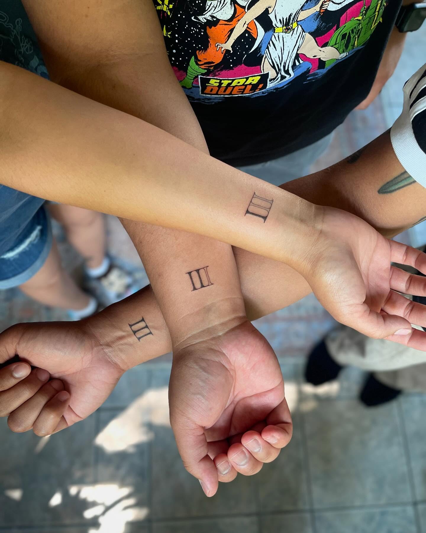 matching-roman-numeral-3-sibling-tattoo-for-3