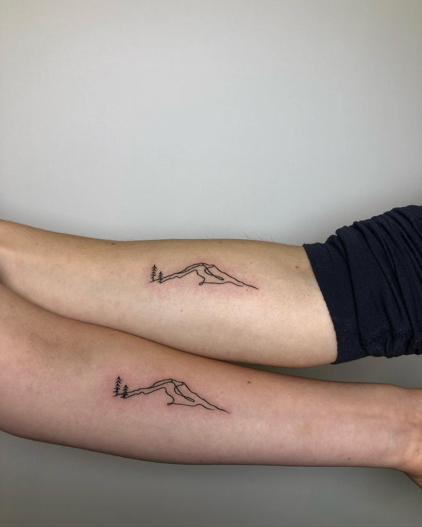 mountain and trees tattoo
