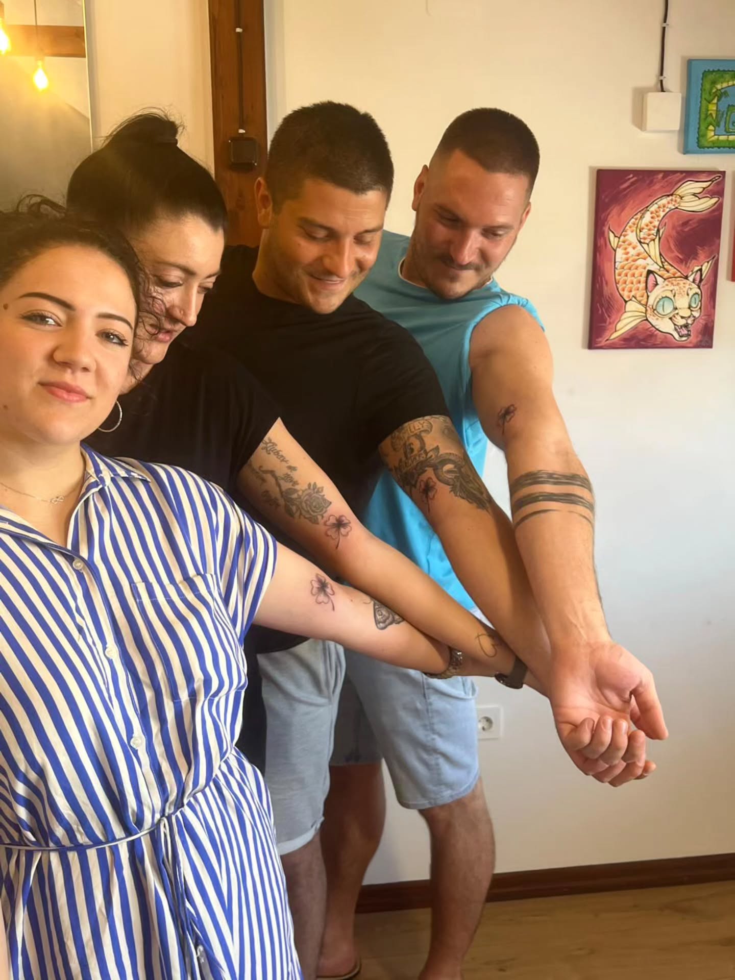 flower-matching-tattoo-for-4-siblings