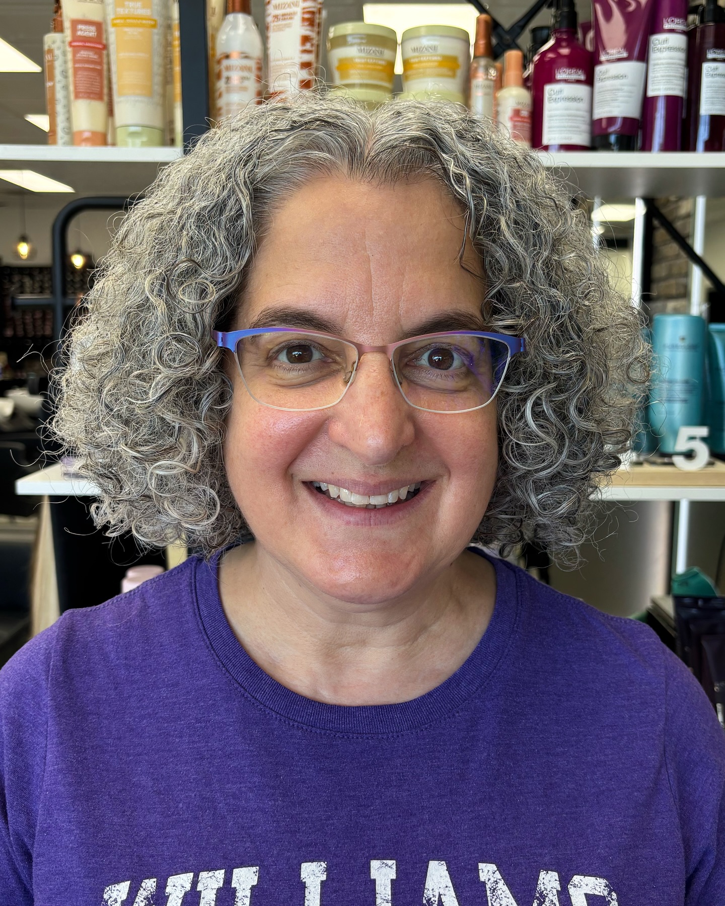 middle-parted-curly-gray-bob