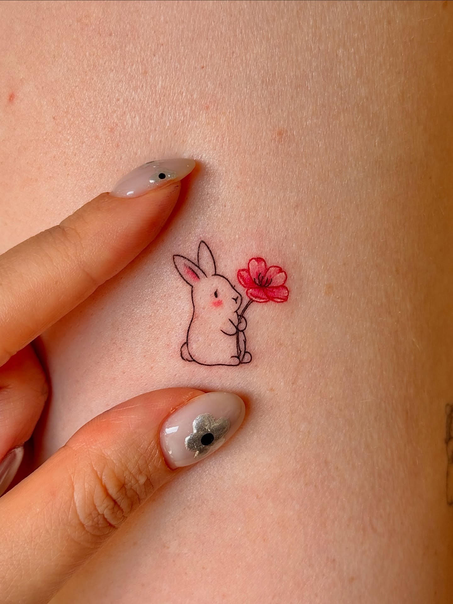 mini-rabit-with-red-flower