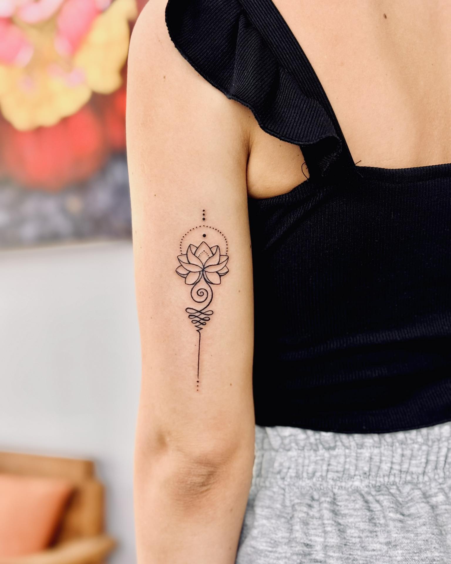 unalome-with-lotus-on-back-arm