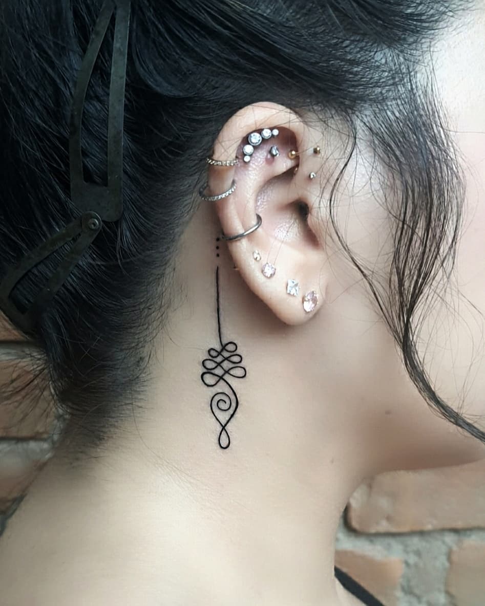 neck-unalome-tattoo-behind-ear