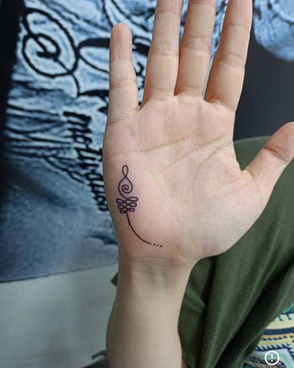 unalome-tattoo-on-palm