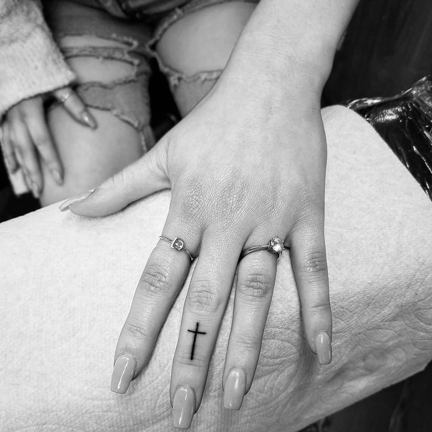 cross-tattoo-on-finger