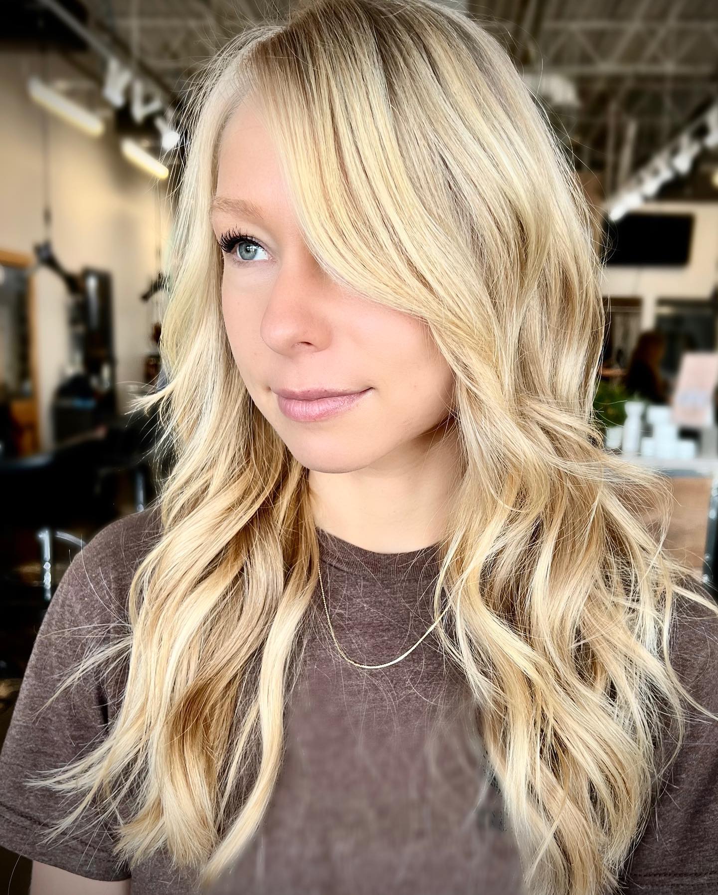 blonde-wavy-hair-with-side-bangs