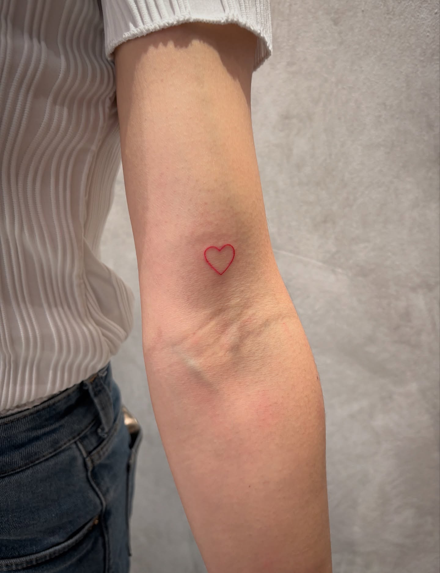 red-small-heart-tattoo