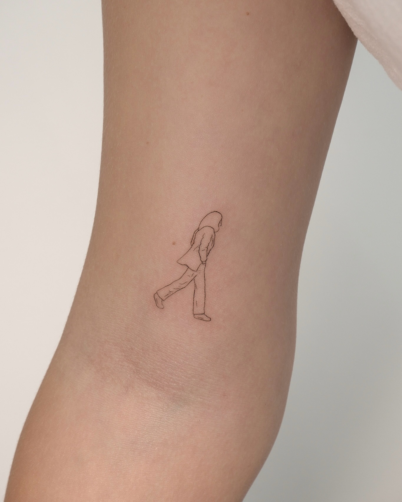 walking-person-tattoo