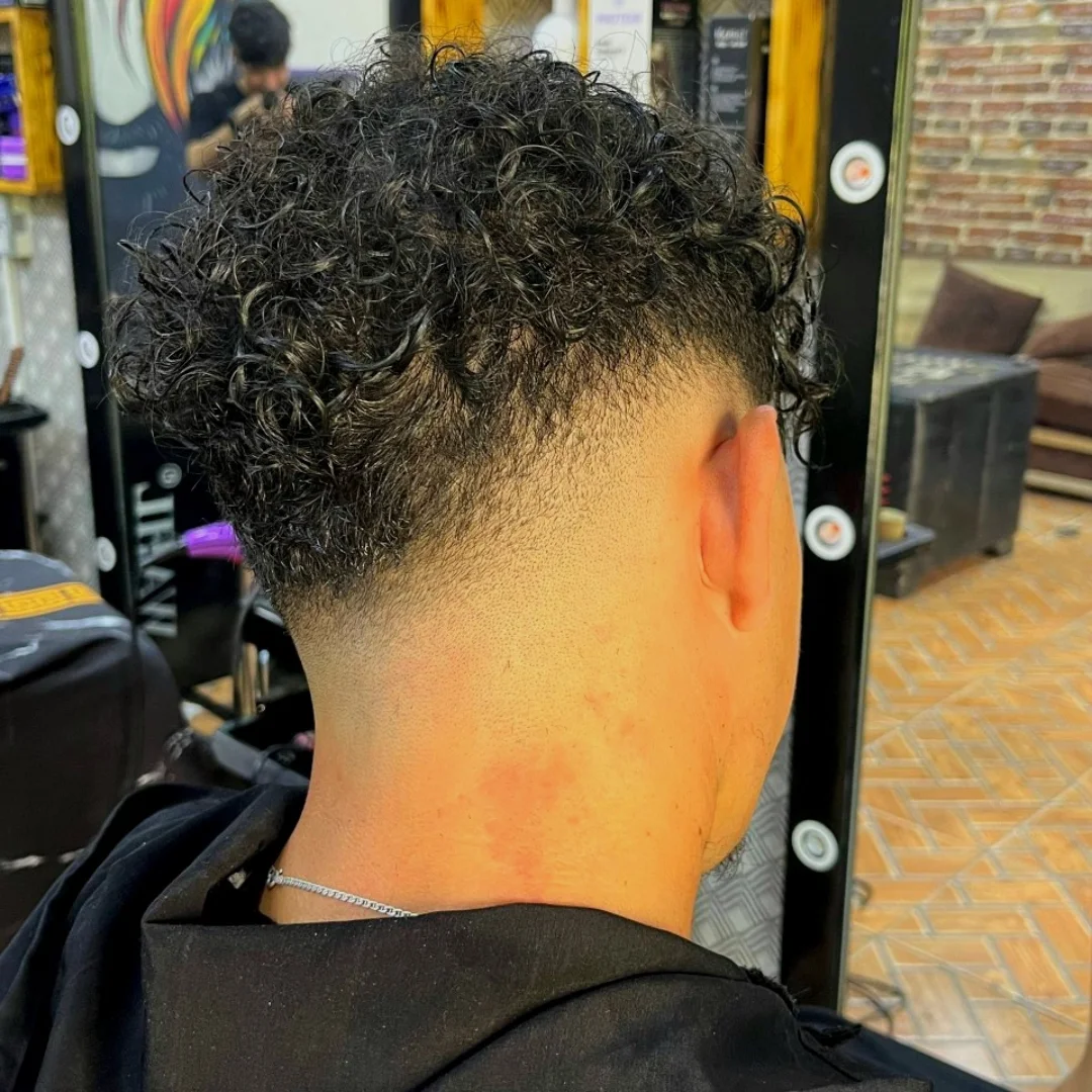high-fade-with-curly-top