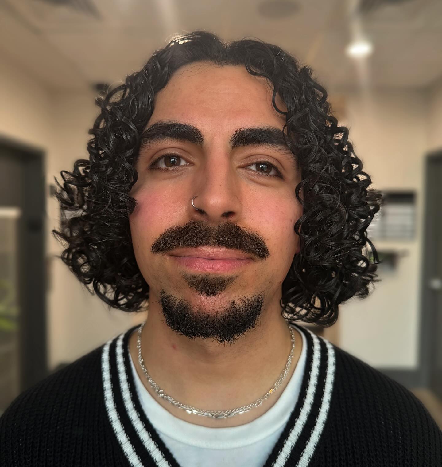 curly-wavy-hair-with-stylish-beard