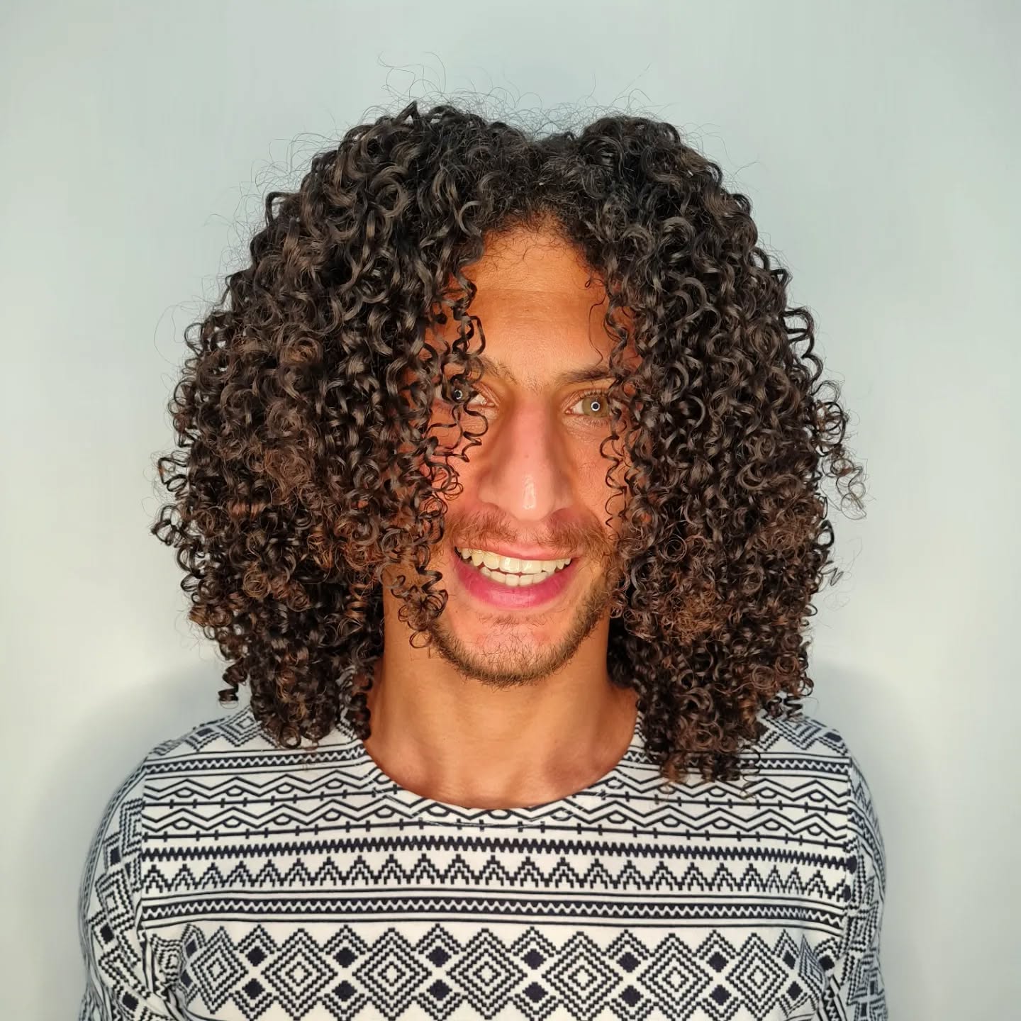 middle-parted-long-curly-hair