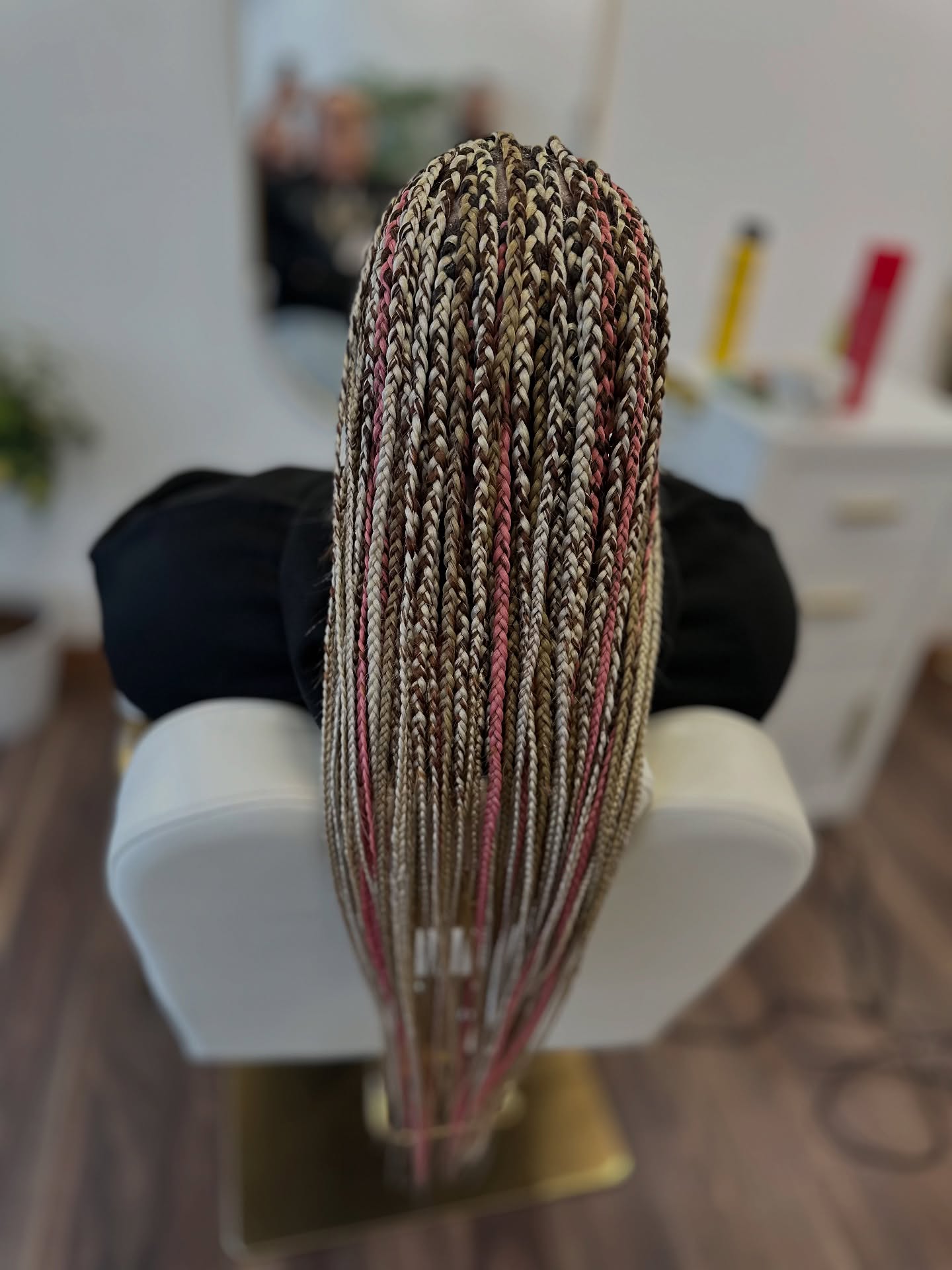 blonde-box-braids-with-touch-of-pink