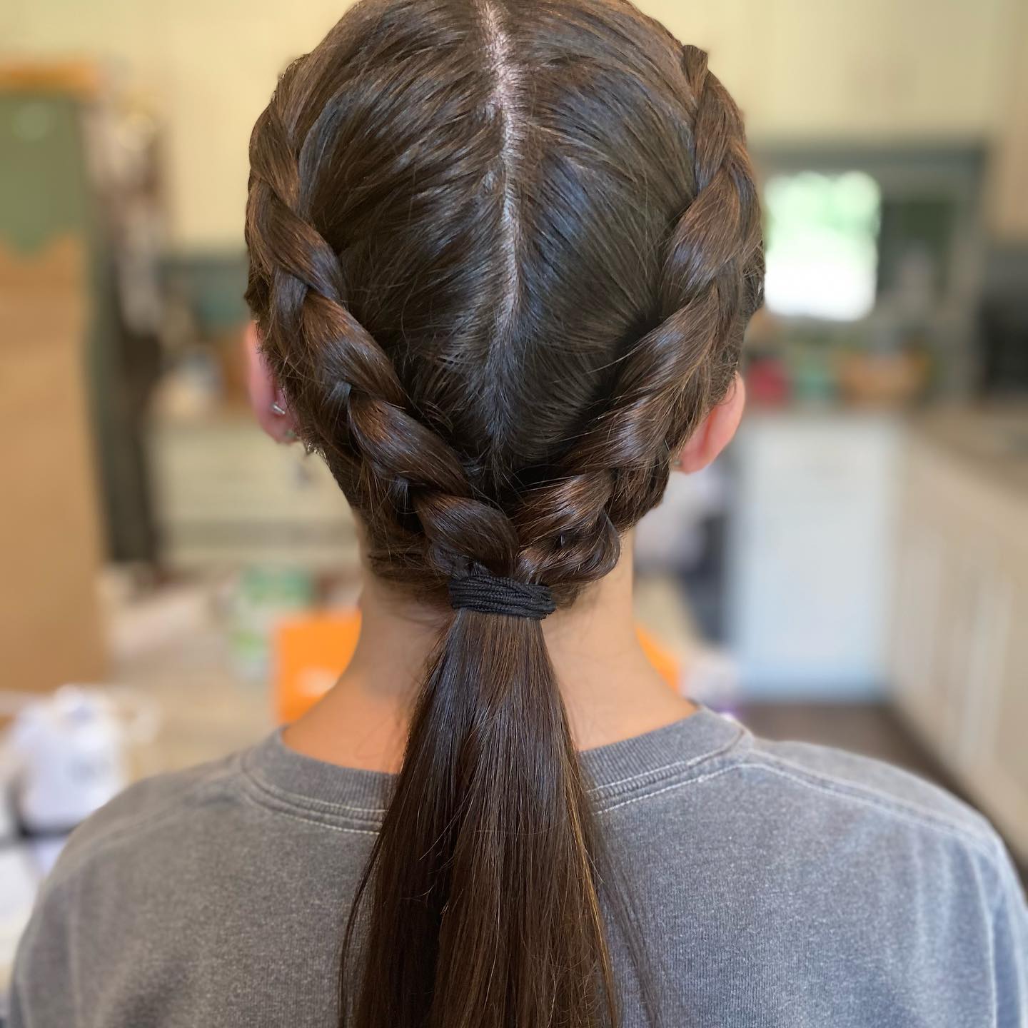 french-braid-with-low-pony
