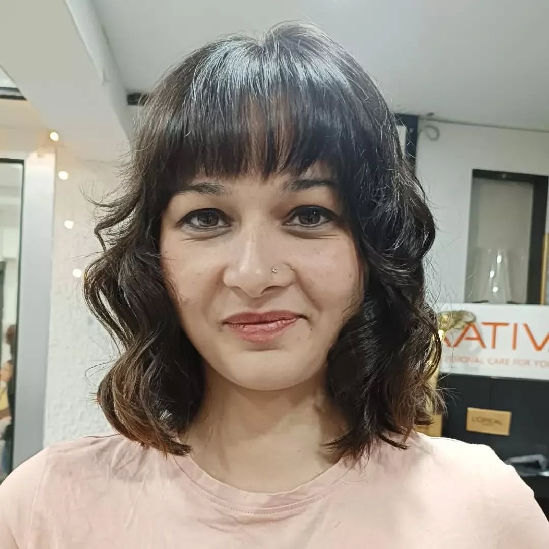 Medium Length Wavy Hair with Bangs