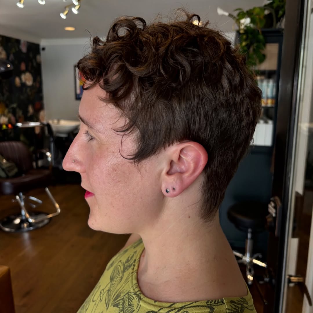 Curly Pixie cut with tailored sides and back
