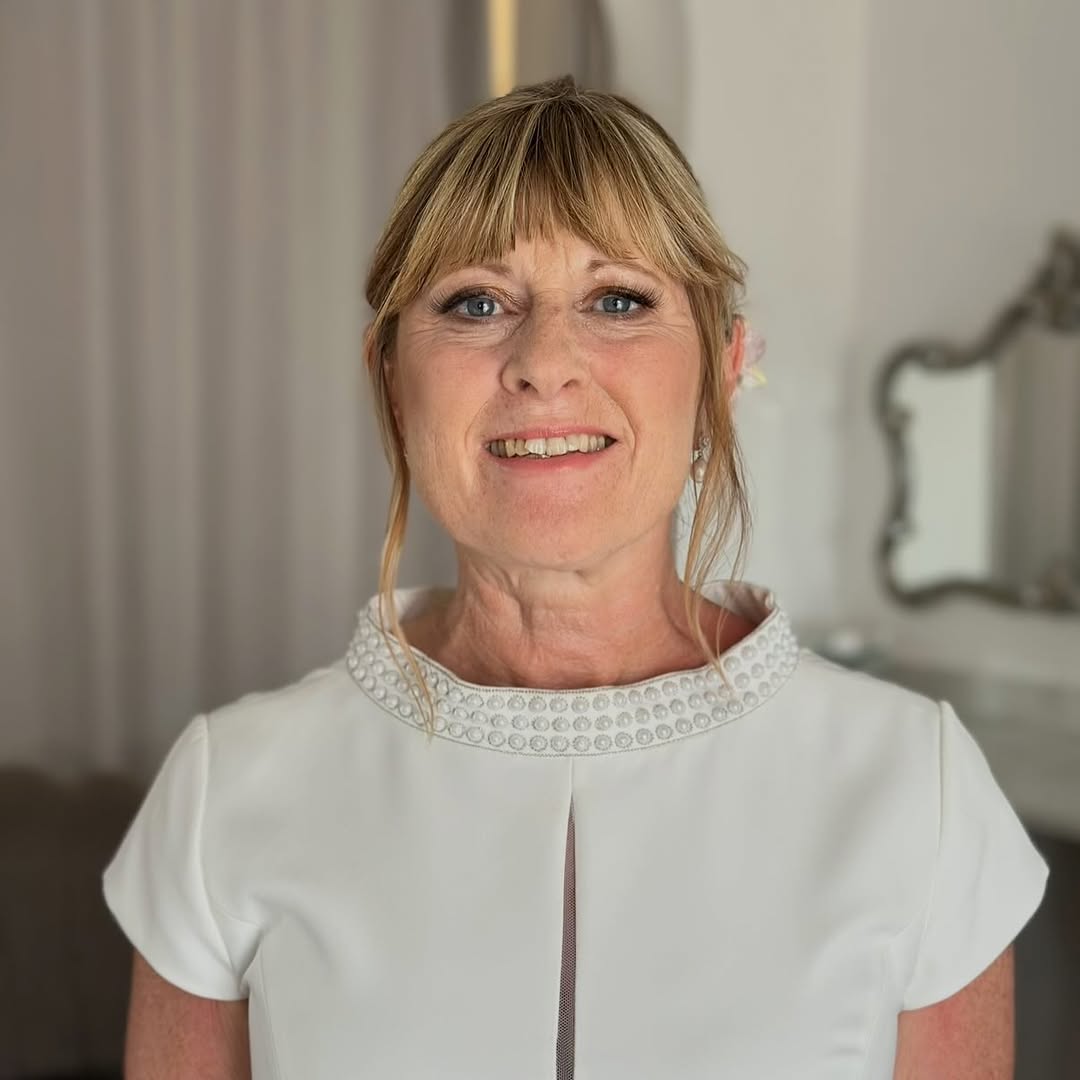 updo with bags and open layers