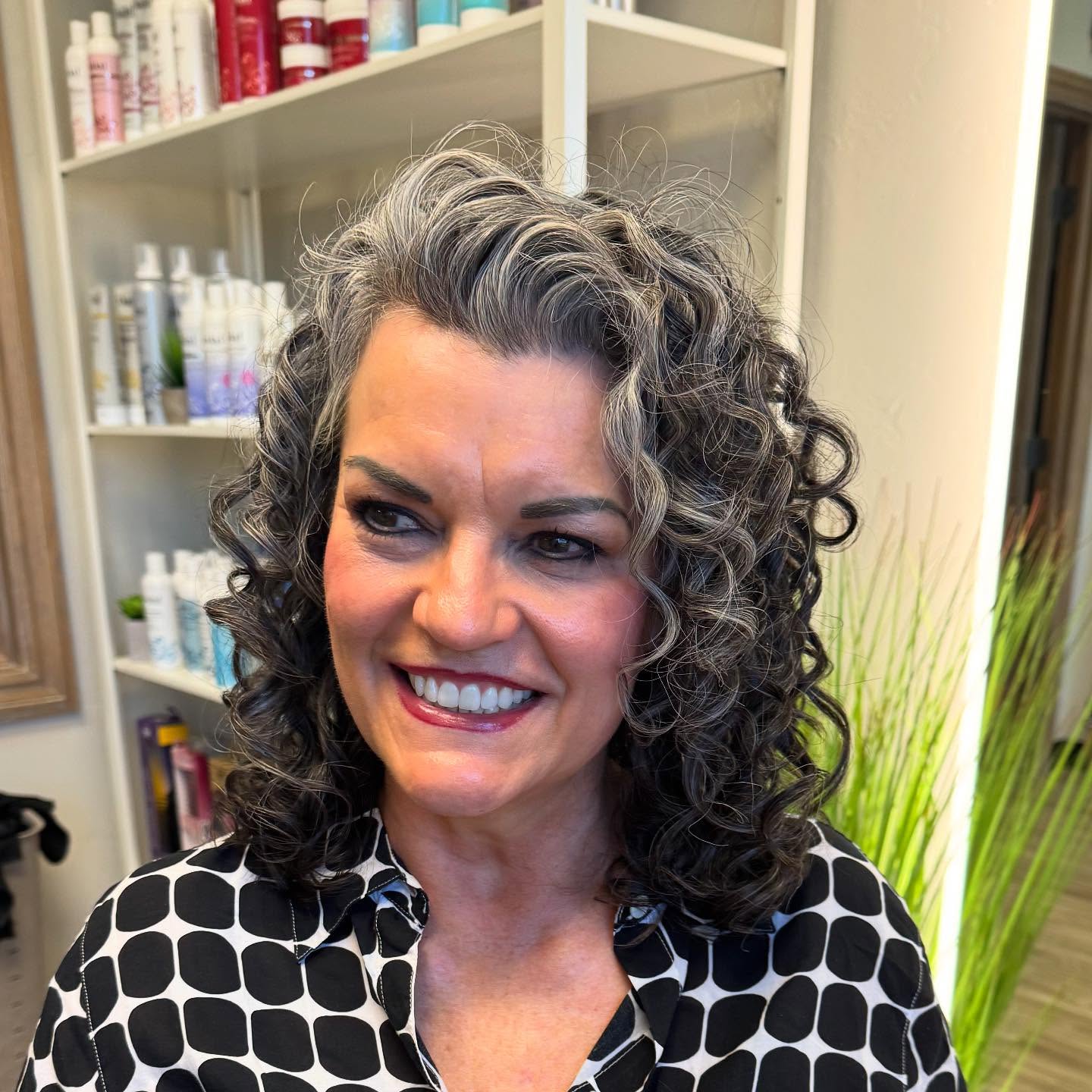 side-parted-mid-length-curly-hair