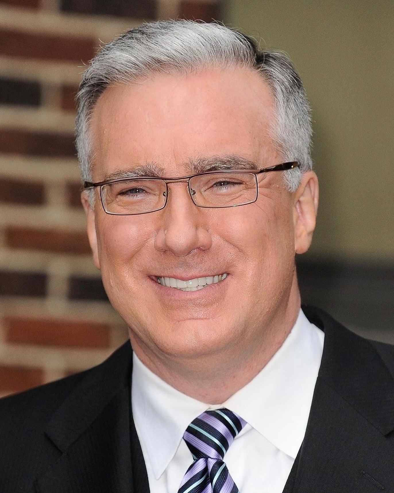 slick-back-gray-hair-with-glasses