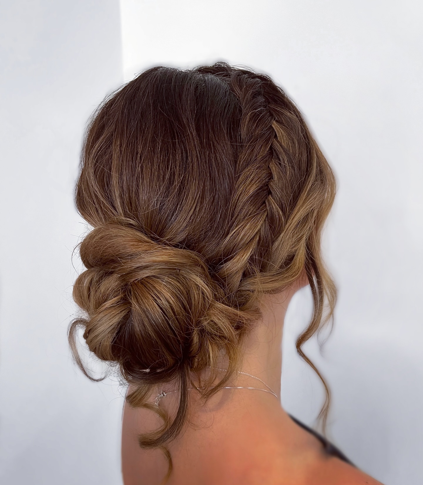 low-bun-with-braids