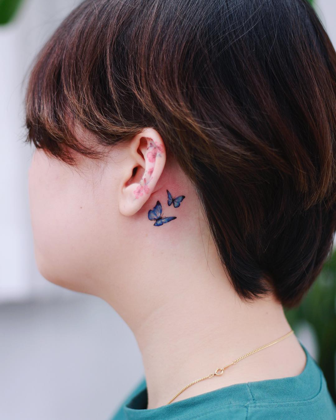 butterfly-behind-ears