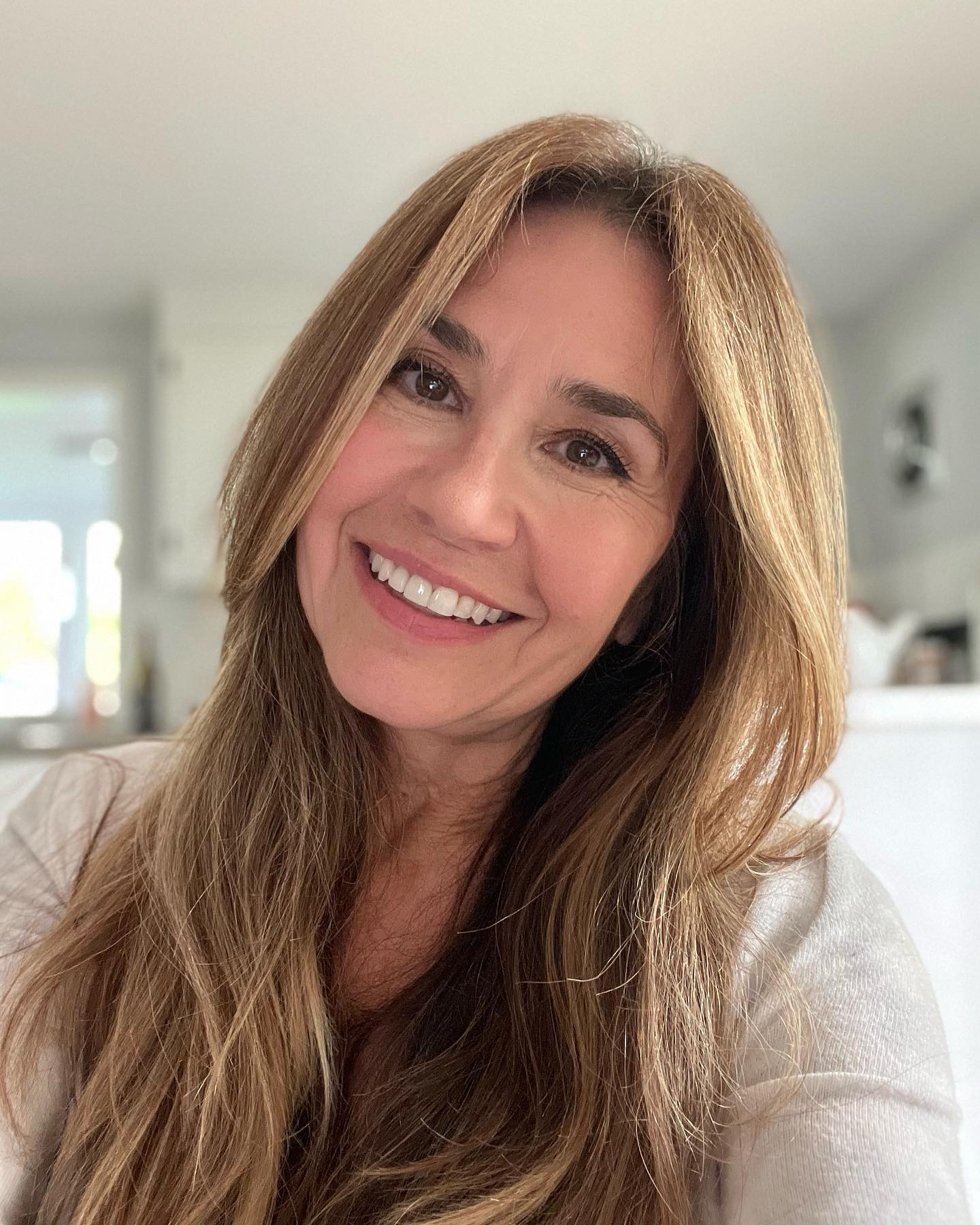 Long Face-Framing Layers with Soft Balayage