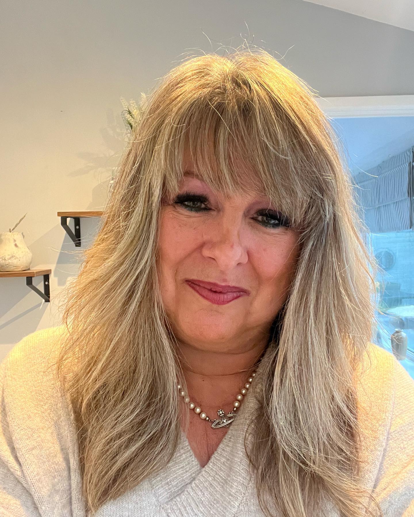 Layered Honey-Blonde Shag with Feathered Fringe