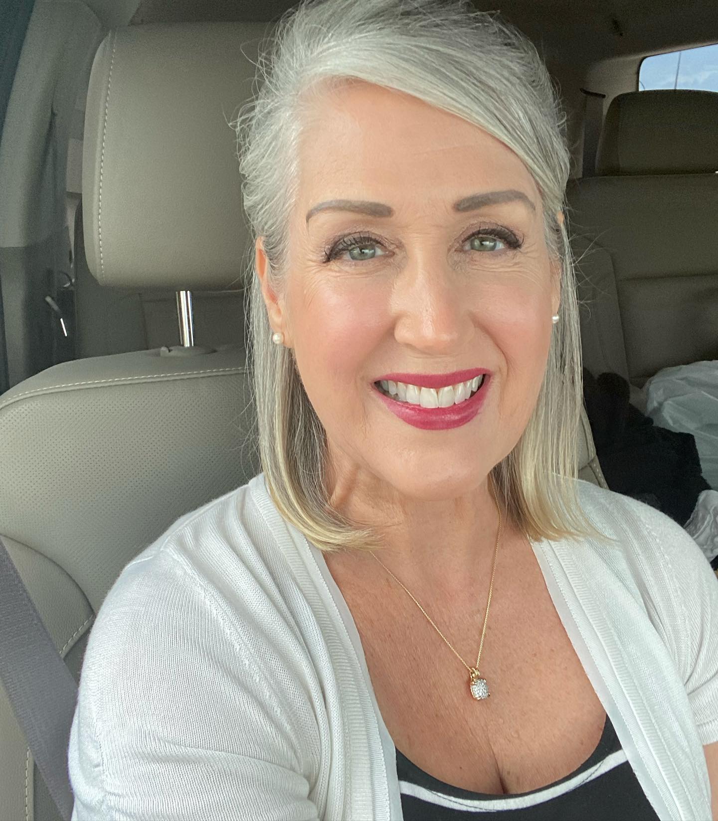 Sleek Silver Side-Swept Bob