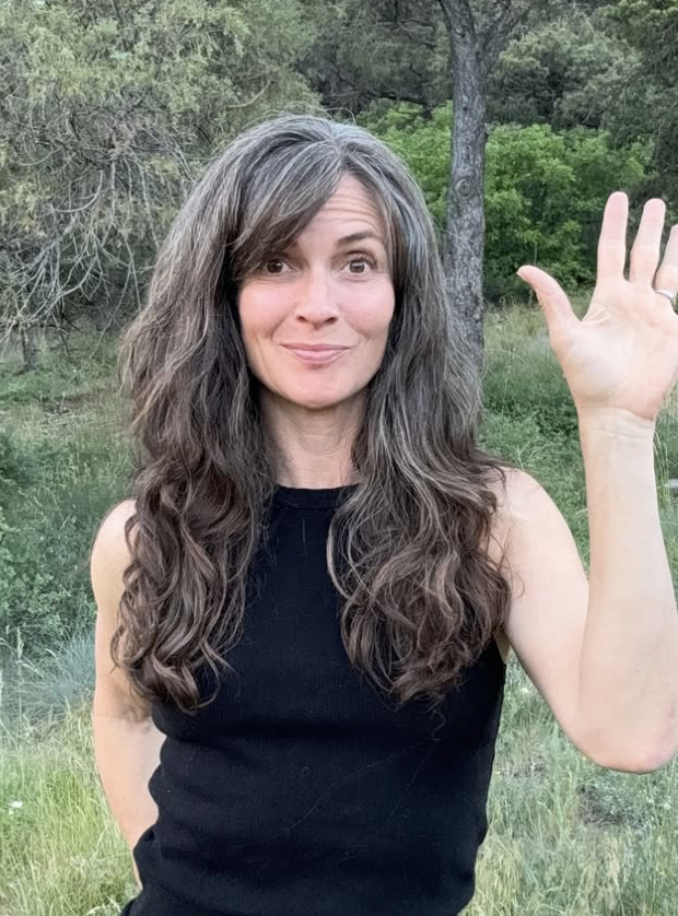 Cascading Brunette Waves with Wispy Side Fringe