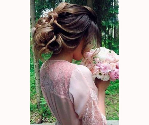 Relaxed Updo With Flowers