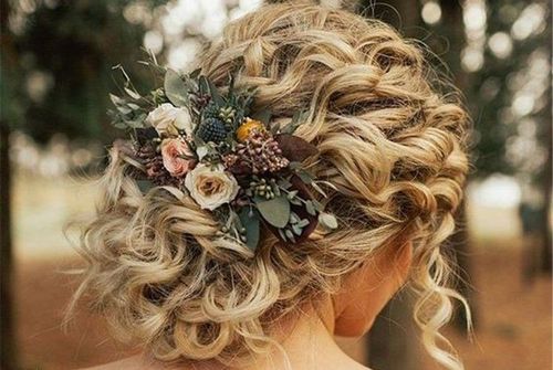 49 A floral updo for curly hair